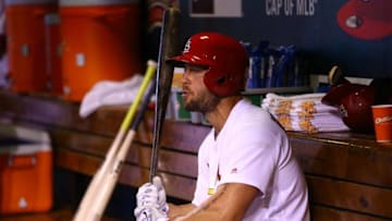 Jun 29, 2016; St. Louis, MO, USA; St. Louis Cardinals left fielder Matt Holliday (7) waits to bat in the dugout against the Kansas City Royals at Busch Stadium. Mandatory Credit: Billy Hurst-USA TODAY Sports