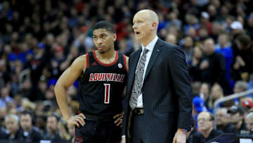 LOUISVILLE, KENTUCKY - FEBRUARY 12: Chris Mack the head coach of the Louisville Cardinals gives instructions to Christen Cunningham #1 against the Duke Blue Devils at KFC YUM! Center on February 12, 2019 in Louisville, Kentucky. (Photo by Andy Lyons/Getty Images)