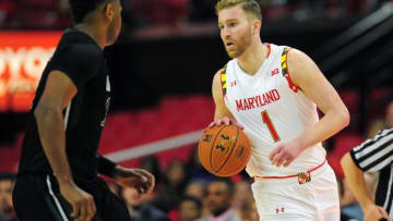 Dec 13, 2014; College Park, MD, USA; Maryland Terrapins forward Evan Smotrycz (1) dribbles the ball in the first half against the South Carolina Upstate Spartans at Xfinity Center. The Terrapins won 67-57. Mandatory Credit: Evan Habeeb-USA TODAY Sports