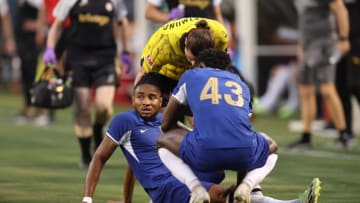 CHICAGO, ILLINOIS - AUGUST 2: Christopher Nkunku of Chelsea goes down with an injury in the first half resulting in him leaving the game during the pre-season friendly match between Chelsea FC and Borussia Dortmund at Soldier Field on August 2, 2023 in Chicago, Illinois. (Photo by Matthew Ashton - AMA/Getty Images)