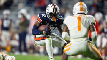 Auburn football wide receiver Eli Stove (12) turns up field after a catch at Jordan-Hare Stadium in Auburn, Ala., on Saturday, Nov. 21, 2020. Auburn defeated Tennessee 30-17.