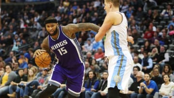 Jan 3, 2017; Denver, CO, USA; Sacramento Kings forward DeMarcus Cousins (left) drives to the basket against Denver Nuggets forward Nikola Jokic (right) during the second half at Pepsi Center. The Kings won 120-113. Mandatory Credit: Chris Humphreys-USA TODAY Sports