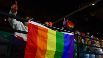 Jun 22, 2022; Baltimore, Maryland, USA; Attendees display flags on LGBTQ+ Pride Night at Oriole Park at Camden Yards during the game a between Washington Nationals and Baltimore Orioles. Mandatory Credit: Tommy Gilligan-USA TODAY Sports