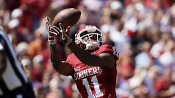 Oct 8, 2016; Dallas, TX, USA; Oklahoma Sooners wide receiver Dede Westbrook (11) catches a touchdown pass in the second quarter against the Texas Longhorns at Cotton Bowl. Mandatory Credit: Tim Heitman-USA TODAY Sports