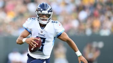 GREEN BAY, WI - AUGUST 09: Marcus Mariota #8 of the Tennessee Titans drops back to pass against the Green Bay Packers during a preseason game at Lambeau Field on August 9, 2018 in Green Bay, Wisconsin. The Packers defeated the Titans 31-17. (Photo by Stacy Revere/Getty Images)
