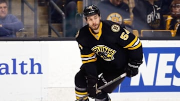 Mar 8, 2015; Boston, MA, USA; Boston Bruins defenseman Adam McQuaid (54) skates with the puck against the Detroit Red Wings during the first period at TD Garden. Mandatory Credit: Winslow Townson-USA TODAY Sports