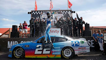 LEXINGTON, OHIO - AUGUST 10: Austin Cindric, driver of the #22 PPG Ford, celebrates after winning the B&L Transport 170 at Mid-Ohio Sports Car Course on August 10, 2019 in Lexington, Ohio. (Photo by Meg Oliphant/Getty Images)