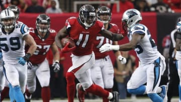 Oct 2, 2016; Atlanta, GA, USA; Atlanta Falcons wide receiver Julio Jones (11) stiff arms Carolina Panthers cornerback Bene