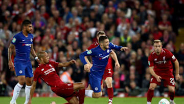 LIVERPOOL, ENGLAND - SEPTEMBER 26: Mateo Kovacic of Chelsea is tackles by Fabinho of Liverpool during the Carabao Cup Third Round match between Liverpool and Chelsea at Anfield on September 26, 2018 in Liverpool, England. (Photo by Jan Kruger/Getty Images)