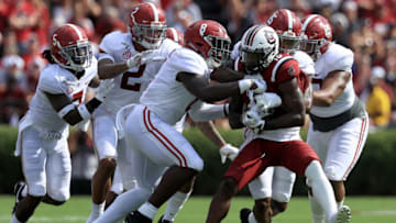 COLUMBIA, SOUTH CAROLINA - SEPTEMBER 14: Shi Smith #13 of the South Carolina Gamecocks is tackled by Christian Harris #8 of the Alabama Crimson Tide during their game at Williams-Brice Stadium on September 14, 2019 in Columbia, South Carolina. (Photo by Streeter Lecka/Getty Images)