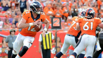 Oct 2, 2016; Tampa, FL, USA; Denver Broncos quarterback Paxton Lynch (12) drops back to pass in the second half against the Tampa Bay Buccaneers at Raymond James Stadium. Mandatory Credit: Jonathan Dyer-USA TODAY Sports