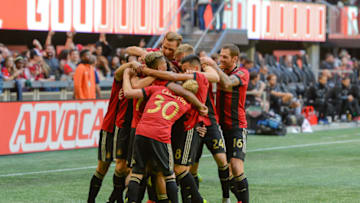 ATLANTA, GA OCTOBER 21: Atlanta United players celebrate a goal scored by Franco Escobar (2) during the match between Atlanta United and the Chicago Fire on October 21st, 2018 at Mercedes-Benz Stadium in Atlanta, GA. Atlanta United FC defeated the Chicago Fire by a score of 2 to 1. (Photo by Rich von Biberstein/Icon Sportswire via Getty Images)