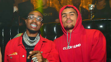 Quavo (L) and Trae Young Atlanta Hawks (Photo by Prince Williams/Wireimage)