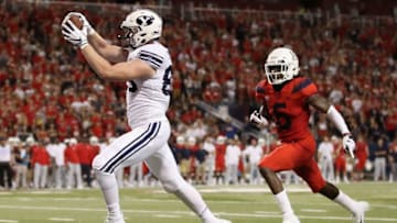 TUCSON, AZ - SEPTEMBER 01: Tight end Matt Bushman #89 of the Brigham Young Cougars scores a 24 yard touchdown reception against the Arizona Wildcats during the second half of the college football game at Arizona Stadium on September 1, 2018 in Tucson, Arizona. The Cougars defeated the Wildcats 28-23. (Photo by Christian Petersen/Getty Images)