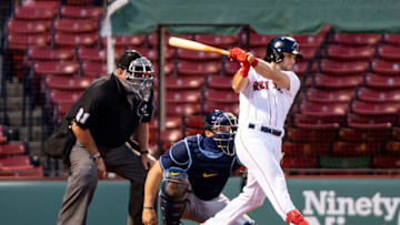 BOSTON, MA - AUGUST 11: Andrew Benintendi #16 of the Boston Red Sox hits a single during the first inning of a game against the Tampa Bay Rays on August 11, 2020 at Fenway Park in Boston, Massachusetts. (Photo by Billie Weiss/Boston Red Sox/Getty Images)
