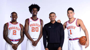 PHOENIX, AZ - SEPTEMBER 25: Eric Bledsoe #2, Josh Jackson #20, Head Coach Earl Watson, and Devin Booker #1 of the Phoenix Suns pose for a portrait at the Talking Stick Resort Arena in Phoenix, Arizona. NOTE TO USER: User expressly acknowledges and agrees that, by downloading and or using this Photograph, user is consenting to the terms and conditions of the Getty Images License Agreement. Mandatory Copyright Notice: Copyright 2017 NBAE (Photo by Barry Gossage/NBAE via Getty Images)