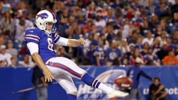 Aug 16, 2013; Orchard Park, NY, USA; Buffalo Bills punter Shawn Powell (6) kicks the ball against the Minnesota Vikings during the second half at Ralph Wilson Stadium. Bills beat the Vikings 20-16. Mandatory Credit: Kevin Hoffman-USA TODAY Sports