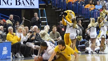 Dec 21, 2016; St. Louis, MO, USA; Illinois Fighting Illini guard Jalen Coleman-Lands (5) and Missouri Tigers guard Jordan Geist (15) fight for the ball during the second half at Scottrade Center. Illinois won 75-66. Mandatory Credit: Denny Medley-USA TODAY Sports