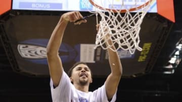 Mar 15, 2014; Las Vegas, NV, USA; UCLA Bruins guard/forward Kyle Anderson (5) celebrates while cutting the net after the championship game of the Pac-12 Conference college basketball tournament against the Arizona Wildcats at MGM Grand Garden Arena. The Bruins defeated the Wildcats 75-71. Mandatory Credit: Kyle Terada-USA TODAY Sports