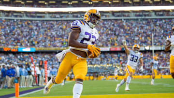 Sep 10, 2022; Baton Rouge, Louisiana, USA; LSU Tigers linebacker Micah Baskerville (23) returns an interception for a score against the Southern Jaguars at Tiger Stadium. Mandatory Credit: Scott Clause-USA TODAY Sports