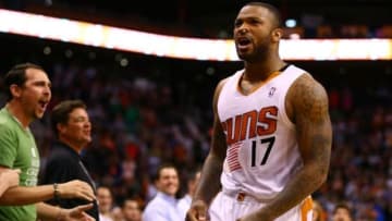 Apr 6, 2014; Phoenix, AZ, USA; Phoenix Suns forward P.J. Tucker celebrates in the closing seconds of the game against the Oklahoma City Thunder at US Airways Center. The Suns defeated the Thunder 122-115. Mandatory Credit: Mark J. Rebilas-USA TODAY Sports