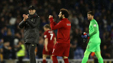 BRIGHTON, ENGLAND - JANUARY 12: Jurgen Klopp, Manager of Liverpool and Mohamed Salah of Liverpool show appreciation to the fans following their sides victory in the Premier League match between Brighton & Hove Albion and Liverpool FC at American Express Community Stadium on January 12, 2019 in Brighton, United Kingdom. (Photo by Bryn Lennon/Getty Images)