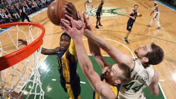 MILWAUKEE, WI - MARCH 2: Victor Oladipo #4 of the Indiana Pacers dunks against Tyler Zeller #44 of the Milwaukee Bucks on March 2, 2018 at the BMO Harris Bradley Center in Milwaukee, Wisconsin. (Photo by Gary Dineen/NBAE via Getty Images)