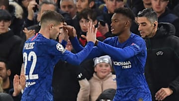 Chelsea's English midfielder Callum Hudson-Odoi (R) comes on for Chelsea's US midfielder Christian Pulisic (L) during the UEFA Champion's League Group H football match between Chelsea and Lille at Stamford Bridge in London on December 10, 2019. (Photo by Glyn KIRK / AFP) (Photo by GLYN KIRK/AFP via Getty Images)