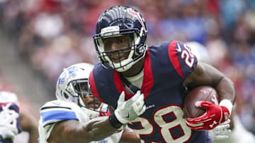 Oct 30, 2016; Houston, TX, USA; Houston Texans running back Alfred Blue (28) rushes during the fourth quarter against the Detroit Lions at NRG Stadium. Mandatory Credit: Troy Taormina-USA TODAY Sports