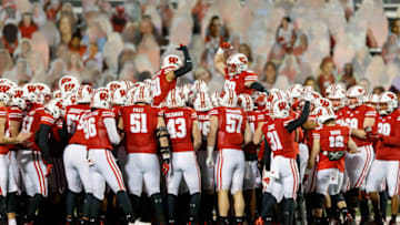 Oct 23, 2020; Madison, Wisconsin, USA; the Wisconsin Badgers gather on the field prior to the game against the Illinois Fighting Illini at Camp Randall Stadium. Mandatory Credit: Jeff Hanisch-USA TODAY Sports