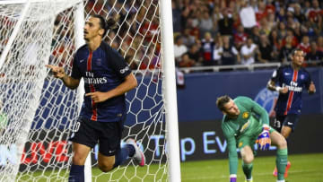 Jul 29, 2015; Chicago, IL, USA; Paris Saint-Germain forward Zlatan Ibrahimovic (10) scores a goal against Manchester United goalkeeper David De Gea (1) during the first half at Soldier Field. Mandatory Credit: Mike DiNovo-USA TODAY Sports