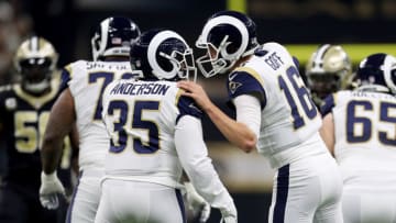 NEW ORLEANS, LOUISIANA - JANUARY 20: Jared Goff #16 of the Los Angeles Rams talks with C.J. Anderson #35 against the New Orleans Saints during the second quarter in the NFC Championship game at the Mercedes-Benz Superdome on January 20, 2019 in New Orleans, Louisiana. (Photo by Chris Graythen/Getty Images)