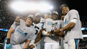 CHARLOTTE, NC - JANUARY 24: Cam Newton #1 of the Carolina Panthers celebrates with his teammates and the George Halas Trophy after defeating the Arizona Cardinals with a score of 49 to 15 to win the NFC Championship Game at Bank of America Stadium on January 24, 2016 in Charlotte, North Carolina. (Photo by Streeter Lecka/Getty Images)