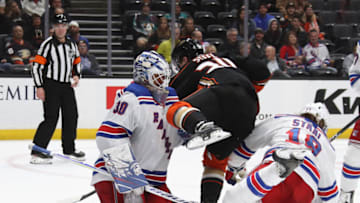 ANAHEIM, CALIFORNIA - DECEMBER 14: Henrik Lundqvist #30 and Marc Staal #18 of the New York Rangers defend against Sam Steel #34 of the Anaheim Ducks at the Honda Center on December 14, 2019 in Anaheim, California. The Ducks defeated the Rangers 4-3 in the shoot-out. (Photo by Bruce Bennett/Getty Images)