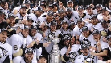 Jun 12, 2016; San Jose, CA, USA; Pittsburgh Penguins players pose for a team photo with the Stanley Cup after defeating the San Jose Sharks in game six of the 2016 Stanley Cup Final at SAP Center at San Jose. Mandatory Credit: Gary A. Vasquez-USA TODAY Sports