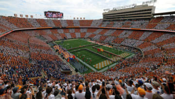 KNOXVILLE, TENNESSEE - SEPTEMBER 24: General view of the Tennessee Volunteers team running through the 'T' before the game against the Florida Gators at Neyland Stadium on September 24, 2022 in Knoxville, Tennessee. Tennessee won the game 38-33. (Photo by Donald Page/Getty Images)