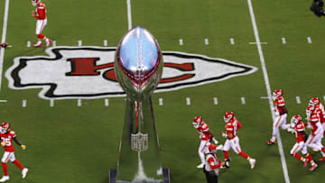 KANSAS CITY, MISSOURI - SEPTEMBER 10: Members of the Kansas City Chiefs take the field with a giant Vince Lombardi trophy at mid field before the start of a game against the Houston Texans at Arrowhead Stadium on September 10, 2020 in Kansas City, Missouri. (Photo by Jamie Squire/Getty Images)