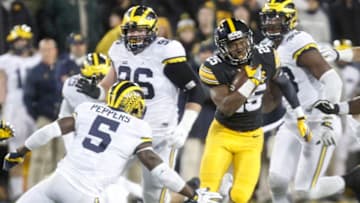 IOWA CITY, IOWA- NOVEMBER 12: Running back Akrum Wadley