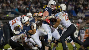 STATE COLLEGE, PA - NOVEMBER 24: Ricky Slade #4 of the Penn State Nittany Lions rushes for a touchdown against the Maryland Terrapins during the third quarter at Beaver Stadium on November 24, 2018 in State College, Pennsylvania. (Photo by Scott Taetsch/Getty Images)