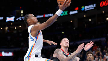 OKC Thunder guard Shai Gilgeous-Alexander (2) goes up for a basket against Houston Rockets : Alonzo Adams-USA TODAY Sports