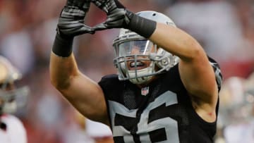 OAKLAND, CA - DECEMBER 7: Linebacker Miles Burris #56 of the Oakland Raiders celebrates a sack against the San Franciso 49ers in the fourth quarter on December 7, 2014 at O.co Coliseum in Oakland, California. The Raiders won 24-13. (Photo by Brian Bahr/Getty Images)