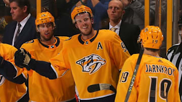 NASHVILLE, TN - DECEMBER 19: Calle Jarnkrok #19 of the Nashville Predators is congratulated by teammates Craig Smith #15 and Ryan Johansen #92 after scoring a goal against the Winnipeg Jets during the first period at Bridgestone Arena on December 19, 2017 in Nashville, Tennessee. (Photo by Frederick Breedon/Getty Images)