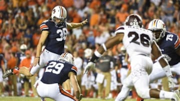 Sep 26, 2015; Auburn, AL, USA; Auburn Tigers place kicker Daniel Carlson (38) kicks the ball during the third quarter against the Mississippi State Bulldogs at Jordan Hare Stadium. Mandatory Credit: John David Mercer-USA TODAY Sports