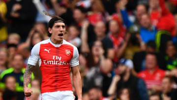 Arsenal's Spanish defender Hector Bellerin celerbates scoring their opening goal during the English Premier League football match between Arsenal and Everton at the Emirates Stadium in London on May 21, 2017. / AFP PHOTO / Justin TALLIS / RESTRICTED TO EDITORIAL USE. No use with unauthorized audio, video, data, fixture lists, club/league logos or 'live' services. Online in-match use limited to 75 images, no video emulation. No use in betting, games or single club/league/player publications. / (Photo credit should read JUSTIN TALLIS/AFP/Getty Images)