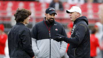 Nov 13, 2021; Columbus, Ohio, USA; Purdue Boilermakers head coach Jeff Brohm(right) and Ohio State Buckeyes head coach Ryan Day before the game between the Ohio State Buckeyes and the Purdue Boilermakers at Ohio Stadium. Mandatory Credit: Joseph Maiorana-USA TODAY Sports