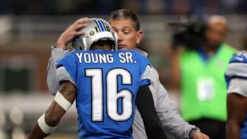 Nov 18, 2012; Detroit, MI, USA; Detroit Lions head coach Jim Schwartz and wide receiver Titus Young (16) chat before the game between the Detroit Lions and Green Bay Packers at Ford Field. Mandatory Credit: Raj Mehta-USA TODAY Sports