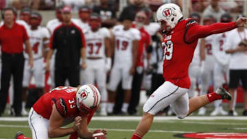 Sep 1, 2016; Salt Lake City, UT, USA; Utah Utes place kicker Andy Phillips (39) kicks a first quarter field goal with holder Utah Utes punter Mitch Wishnowsky (33 at Rice-Eccles Stadium. Mandatory Credit: Jeff Swinger-USA TODAY Sports