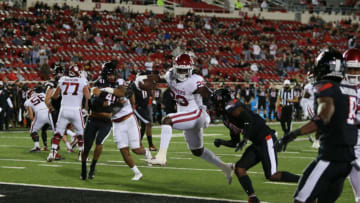 Oct 31, 2020; Lubbock, Texas, USA; Oklahoma Sooners running back Rhamondre Stevenson (29) scores in the first half against the Texas Tech Red Raiders at Jones AT&T Stadium. Mandatory Credit: Michael C. Johnson-USA TODAY Sports