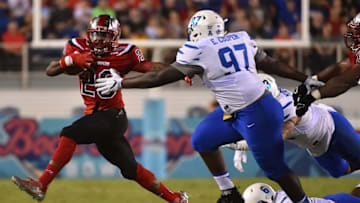 Dec 20, 2016; Boca Raton, FL, USA; Western Kentucky Hilltoppers running back Anthony Wales (20) runs the ball against the Memphis Tigers during the first half at FAU Stadium. Mandatory Credit: Jasen Vinlove-USA TODAY Sports