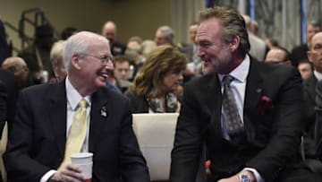 Jan 9, 2015; Dallas, TX, USA; Hall of Fame inductees Bill Snyder (left) and Brian Bosworth (right) speak prior to the press conference at Renaissance Dallas Hotel. Mandatory Credit: Jerome Miron-USA TODAY Sports